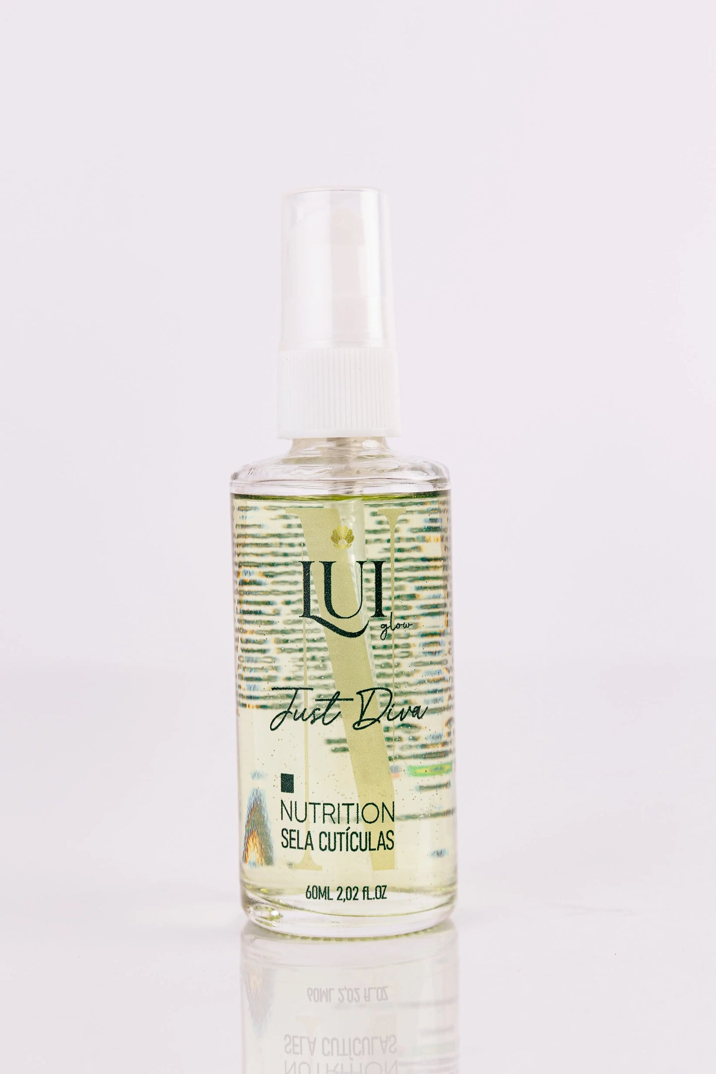 Just Diva Ampoule by Lui Glow in a clear glass bottle with a dropper, highlighting its vibrant liquid inside.