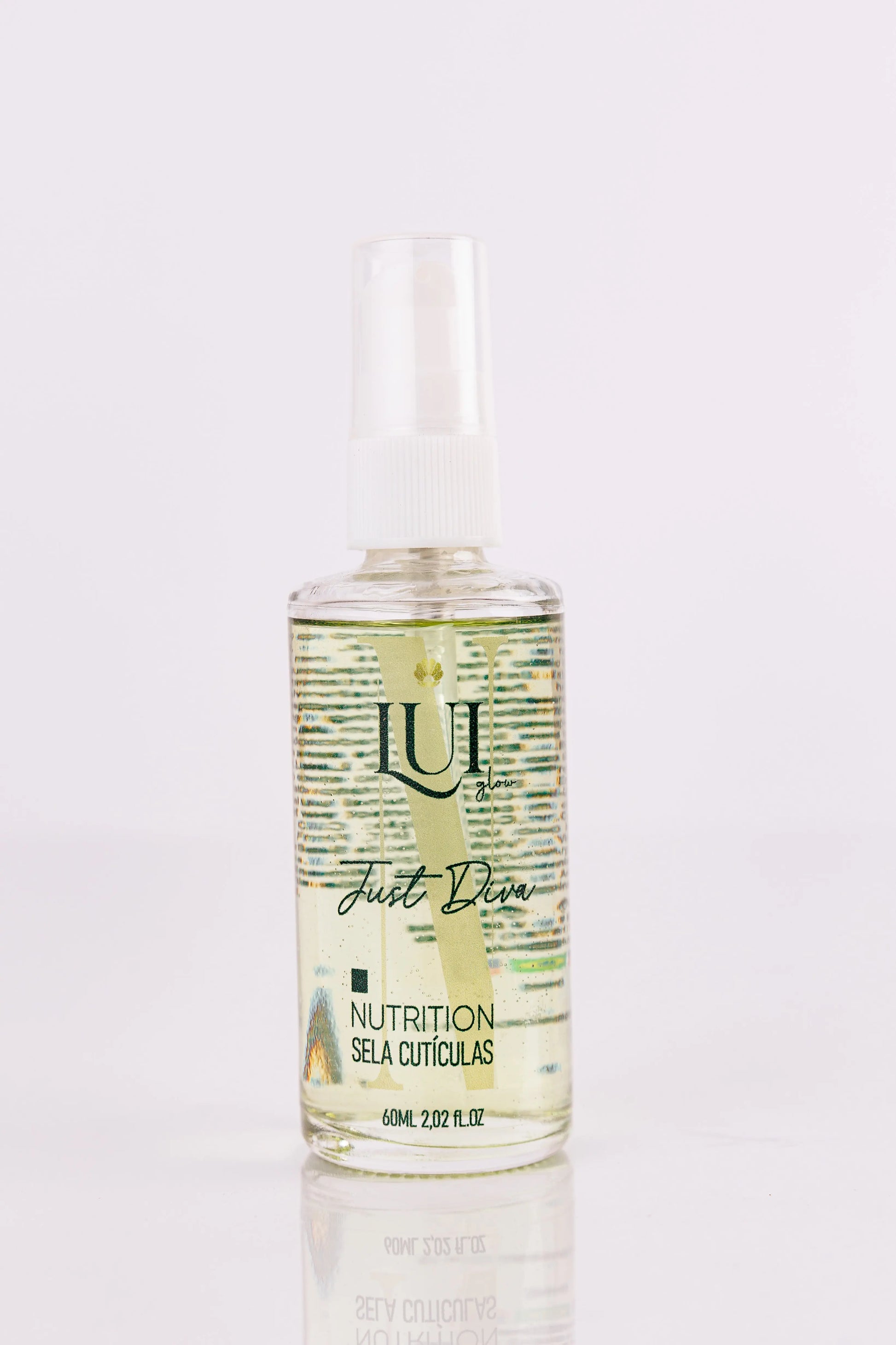 Just Diva Ampoule by Lui Glow in a clear glass bottle with a dropper, highlighting its vibrant liquid inside.